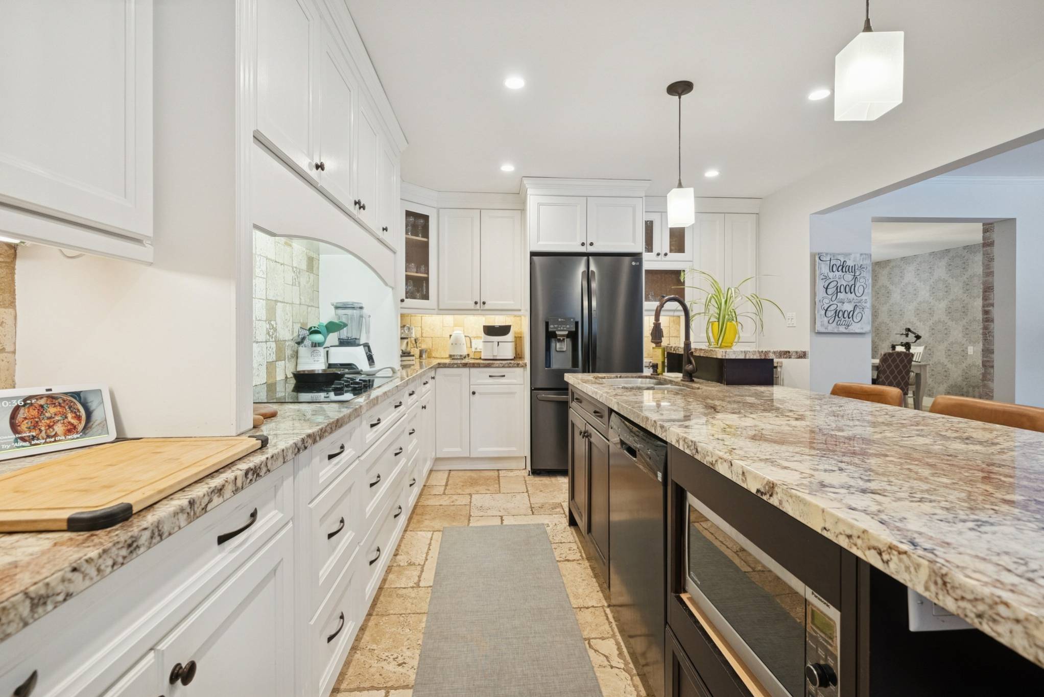 Chef's Kitchen with Granite Counters and Large Center Island at 14574 McCowan Road Whitchurch-Stouffville