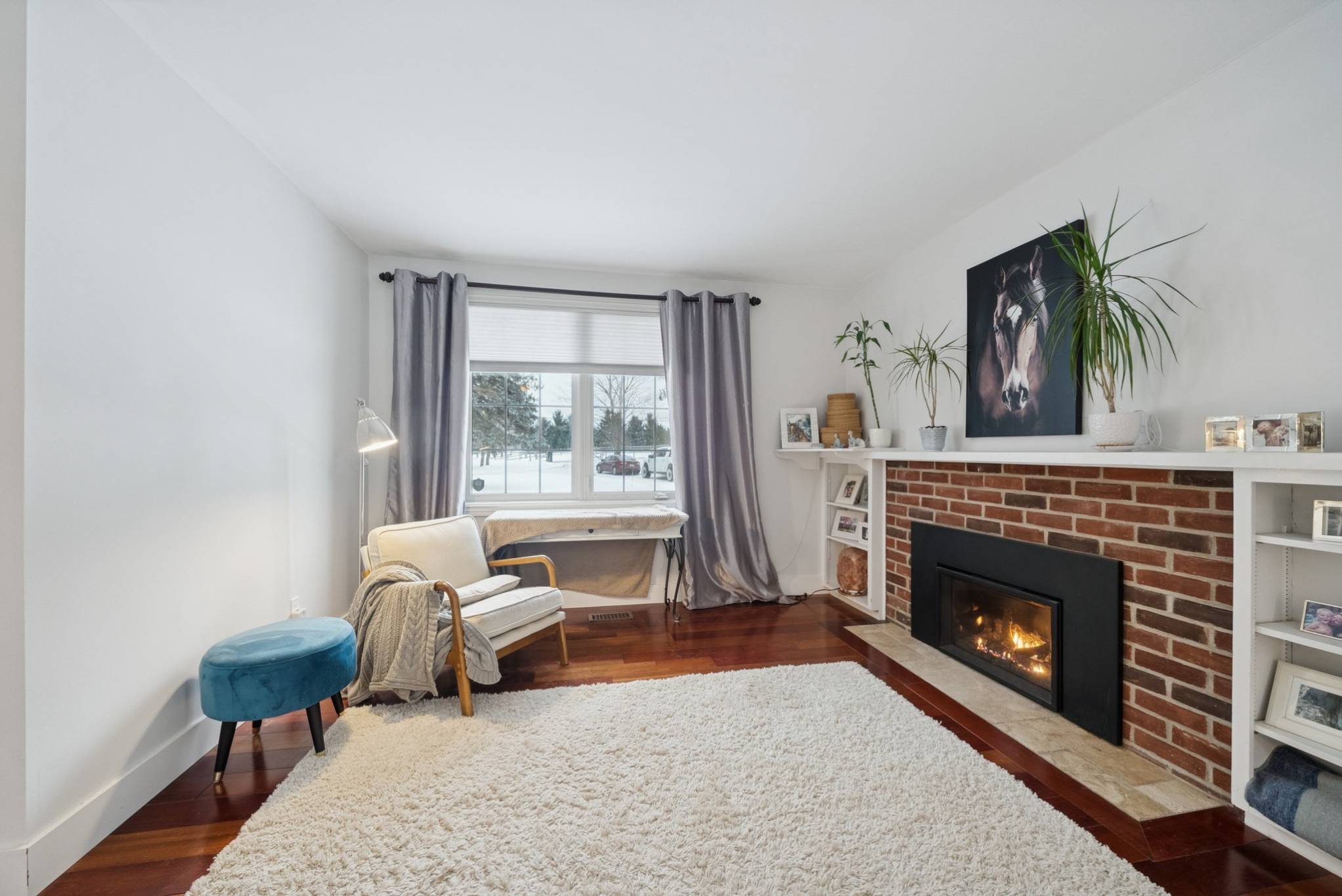 Recently added propane fireplace and sitting area in the primary bedroom at 14574 McCowan Road Whitchurch-Stouffville